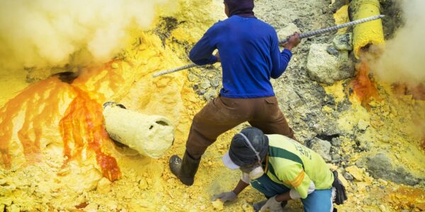 Sulfur Miners at Work, Kawah Ijen Volcano, East Java, Indonesia.