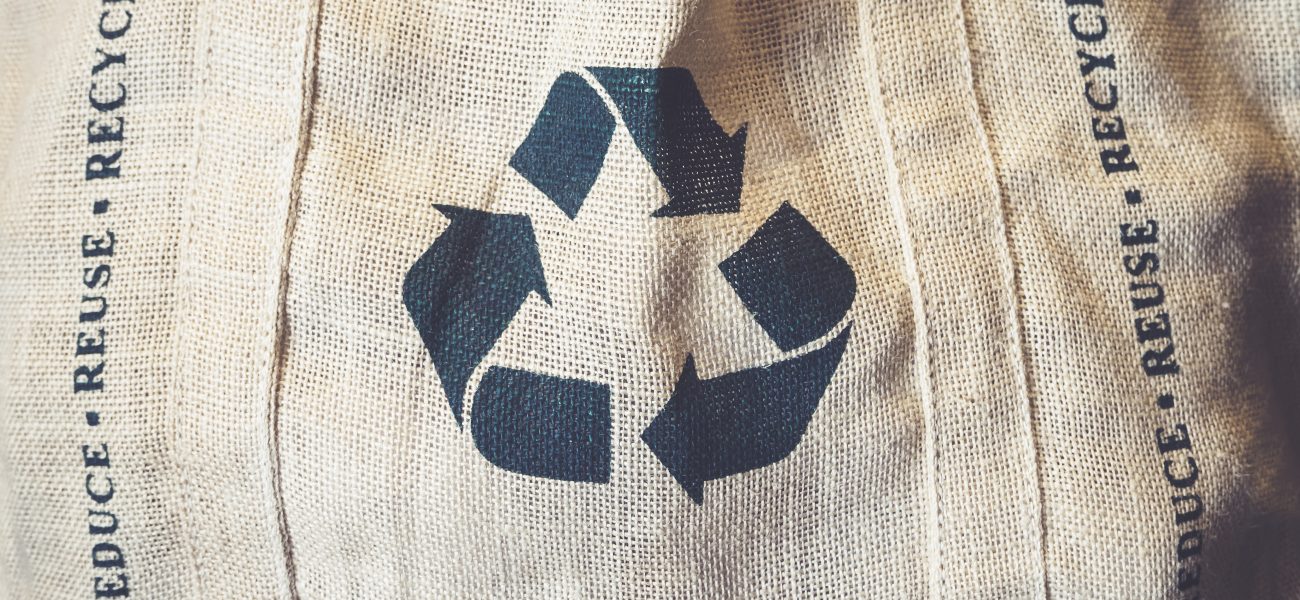 Recycle sign Symbol on Eco Shopping bag Environmental friendly