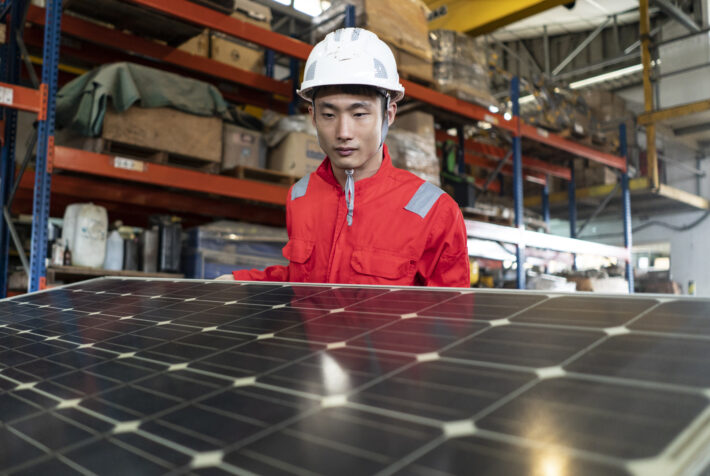 Male Factory Worker with Solar Panel