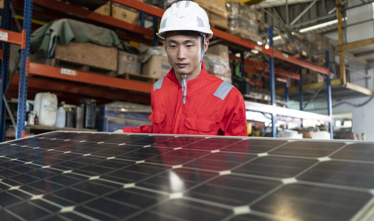 Male Factory Worker with Solar Panel